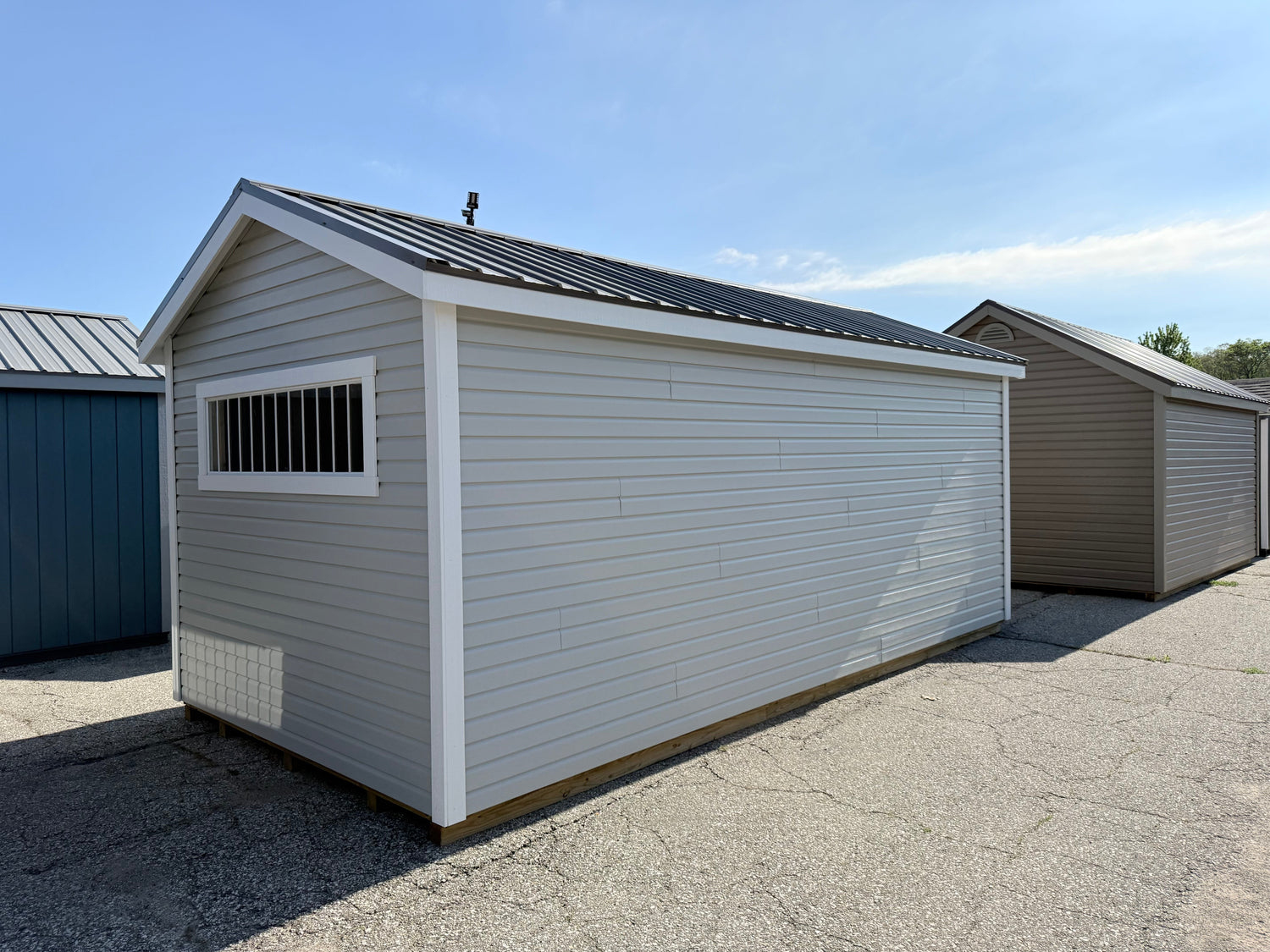 10x20 Vinyl Deluxe Cottage - Cedar Springs Lot - Cedar Rock Barns