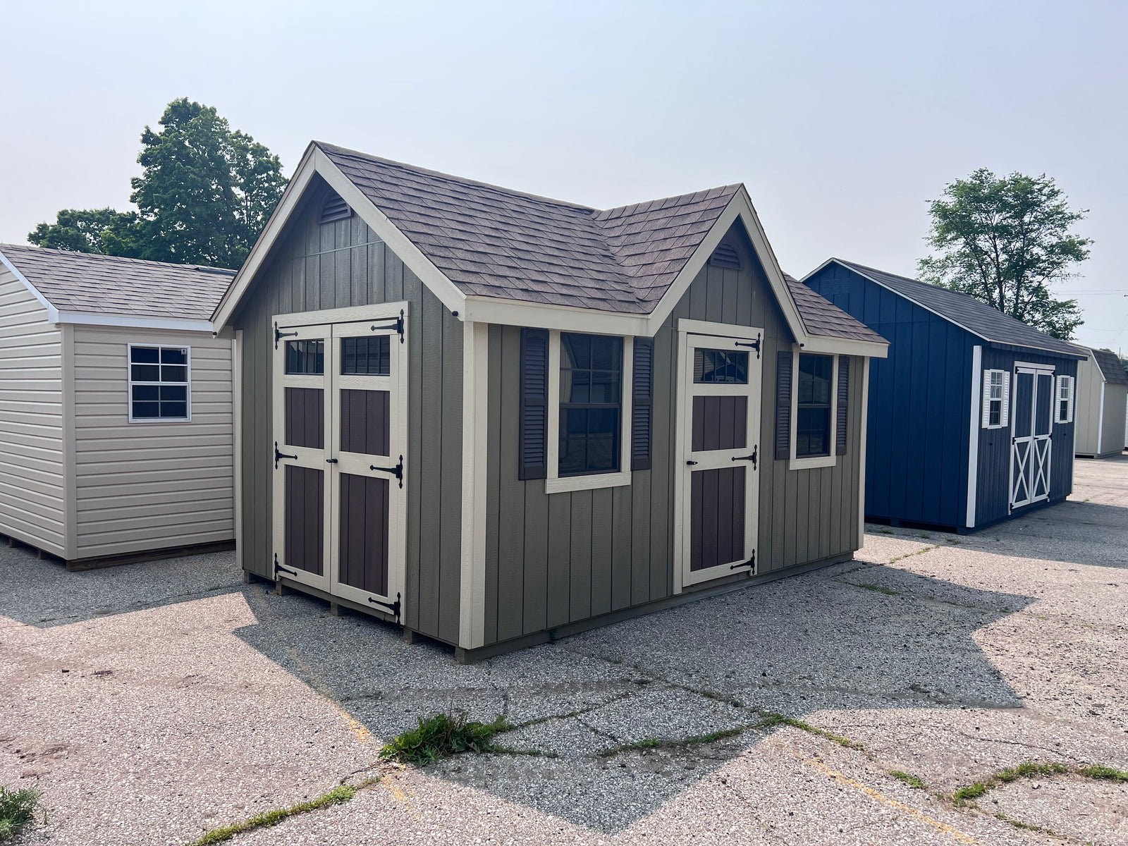 10x16 Painted Deluxe Chalet - QP1072 - Cedar Springs Lot - Cedar Rock Barns