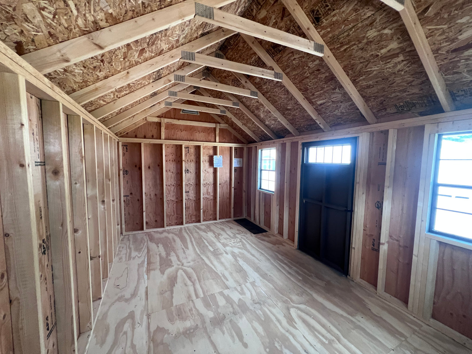 10x16 Painted Deluxe Chalet - QP1072 - Cedar Springs Lot - Cedar Rock Barns