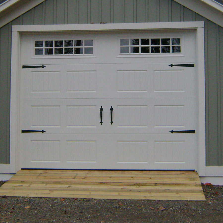 Sectional overhead garage door raised panel and carriage house style - Michigan shed option - Cedar Rock Barns